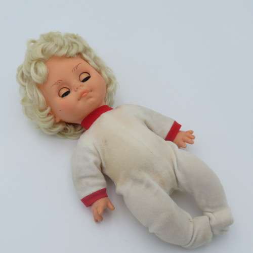 Vintage rubber baby doll with closing eyes