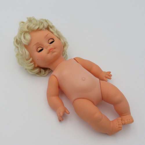 Vintage rubber baby doll with closing eyes