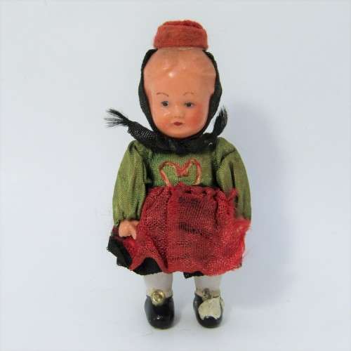 Small vintage boy doll