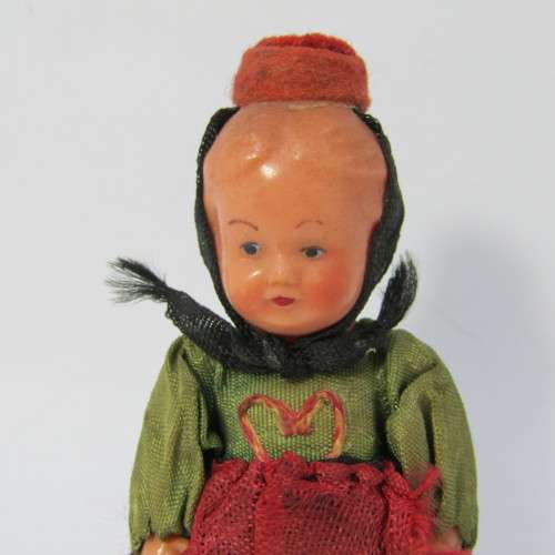 Small vintage boy doll