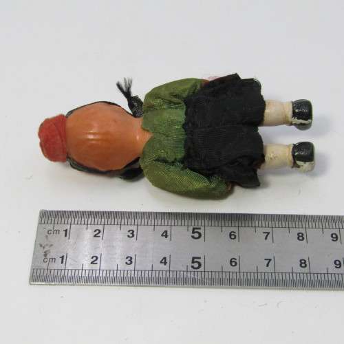 Small vintage boy doll