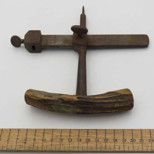 Vintage leather circle cutting tool with bone handle