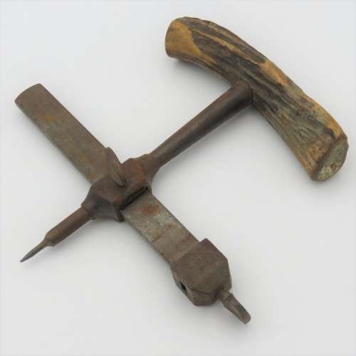 Vintage leather circle cutting tool with bone handle