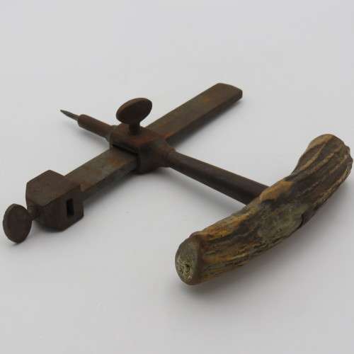 Vintage leather circle cutting tool with bone handle