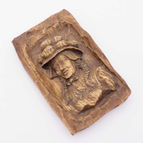 Vintage carved casting of woman