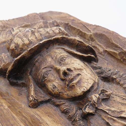 Vintage carved casting of woman