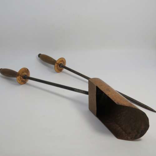 Pair of vintage fire place tools
