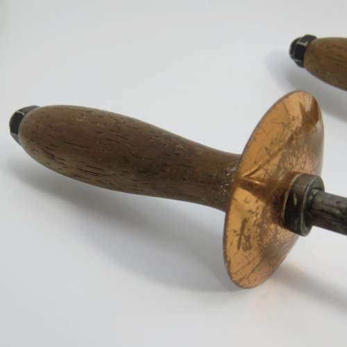 Pair of vintage fire place tools