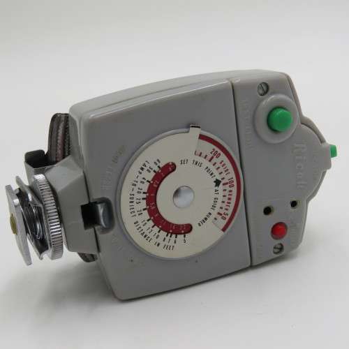 Vintage Ricoh fan flash in leather pouch
