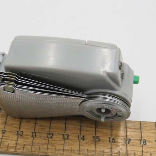 Vintage Ricoh fan flash in leather pouch
