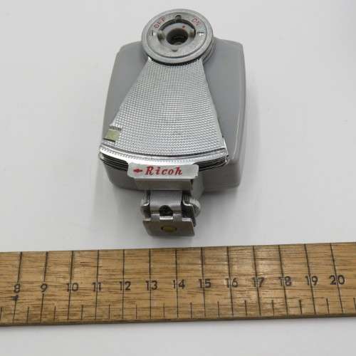Vintage Ricoh fan flash in leather pouch