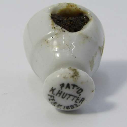 Pair of vintage Ohlssons Cape Breweries - K Hutte porcelain bottle lids