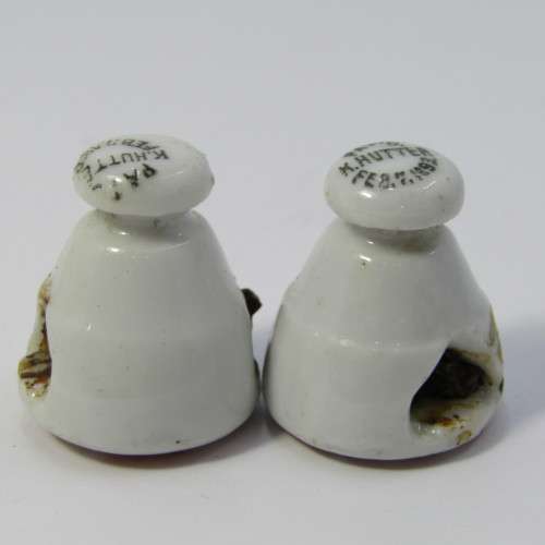 Pair of vintage Ohlssons Cape Breweries - K Hutte porcelain bottle lids