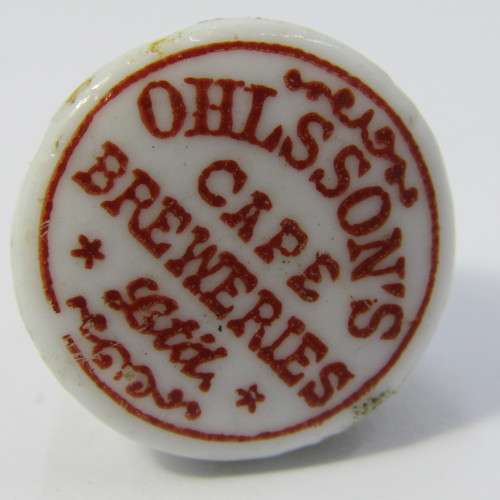 Pair of vintage Ohlssons Cape Breweries - K Hutte porcelain bottle lids