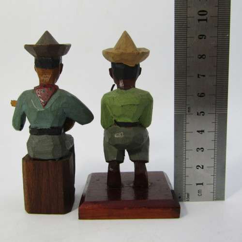 Pair of hand carved wooden ornaments