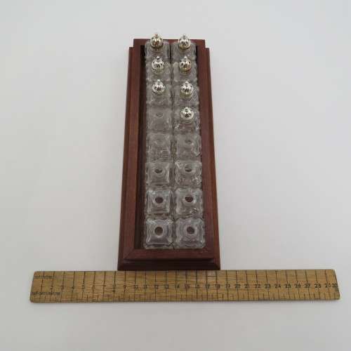 Wooden tray with 16 small salt and pepper shakers - 9 is missing lids