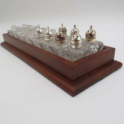 Wooden tray with 16 small salt and pepper shakers - 9 is missing lids