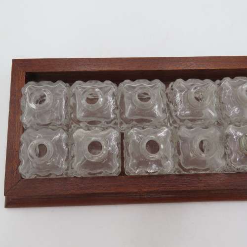 Wooden tray with 16 small salt and pepper shakers - 9 is missing lids