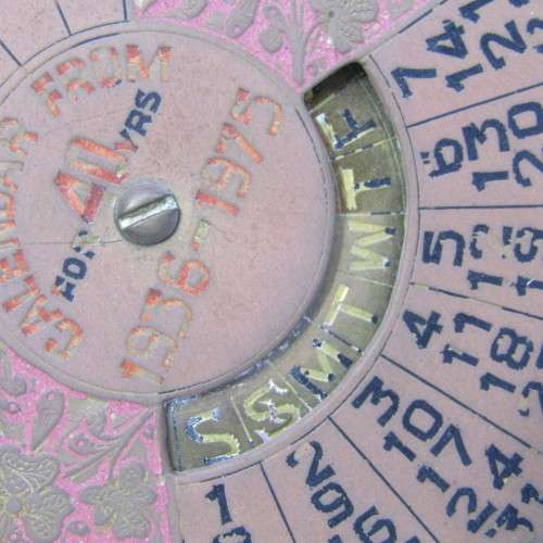 Vintage 1936-1975 brass 40 year calendar