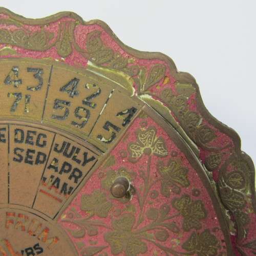 Vintage 1936-1975 brass 40 year calendar