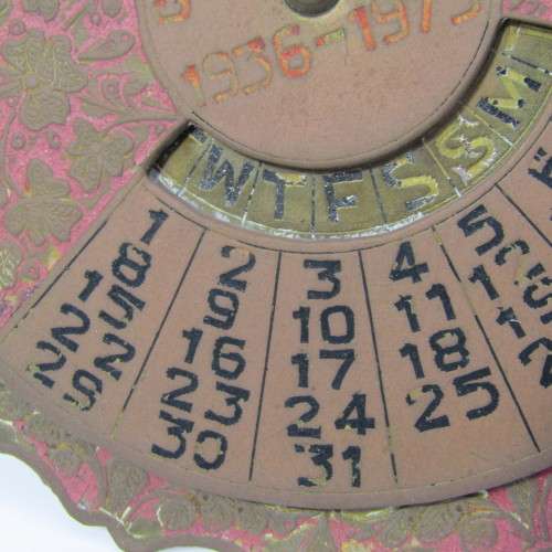 Vintage 1936-1975 brass 40 year calendar