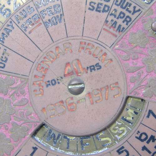 Vintage 1936-1975 brass 40 year calendar