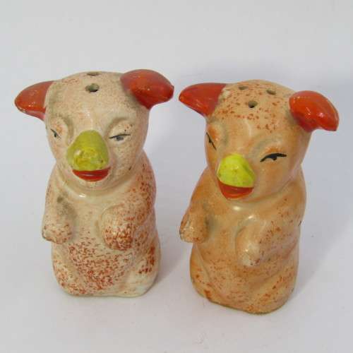 Pair of vintage porcelain pig salt and pepper shakers