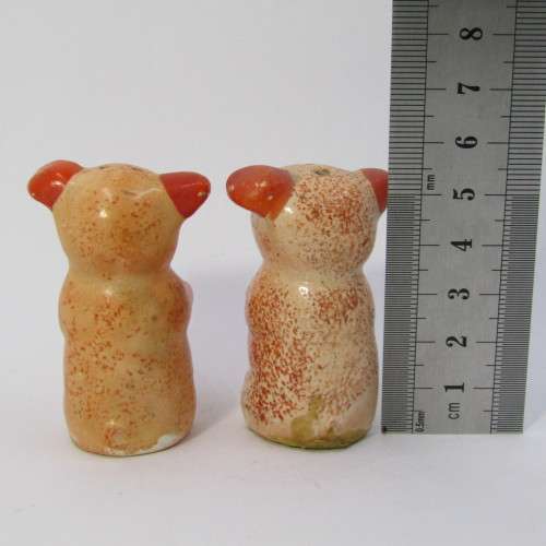 Pair of vintage porcelain pig salt and pepper shakers
