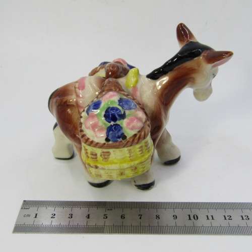 Vintage porcelain donkey with flower basket salt and pepper shakers