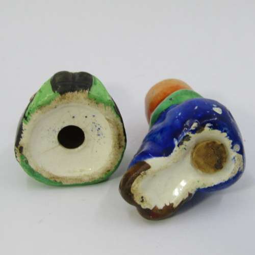 Pair of vintage Dutch boy and girl salt and pepper shakers on stand