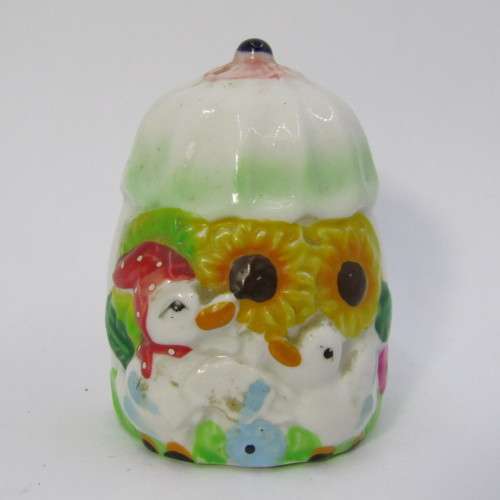 Pair of porcelain salt and pepper shakers with ducks and flowers