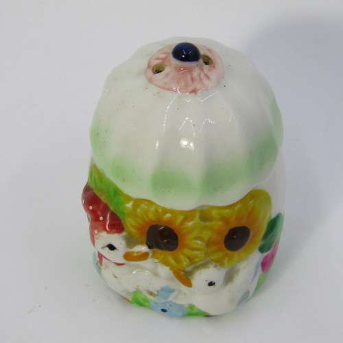 Pair of porcelain salt and pepper shakers with ducks and flowers