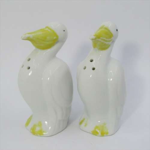 Pair of porcelain Pelican salt and pepper shakers