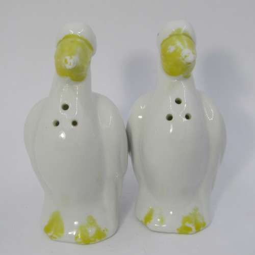 Pair of porcelain Pelican salt and pepper shakers