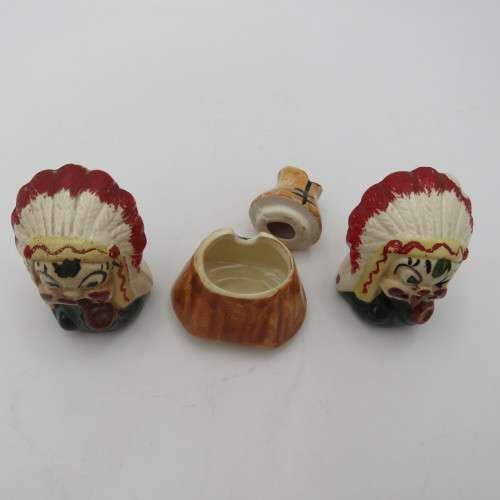 Vintage chiefs salt and pepper shakers on boat stand with mustard pot