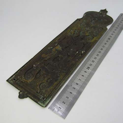 Vintage brass Stork and Baby themed door decor piece