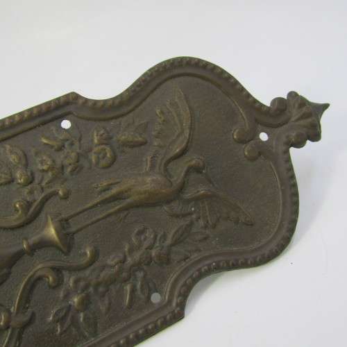 Vintage brass Stork and Baby themed door decor piece