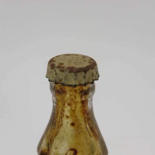 Vintage miniature Coca-Cola bottles in yellow tray - Two Coke bottles missing and was replaced