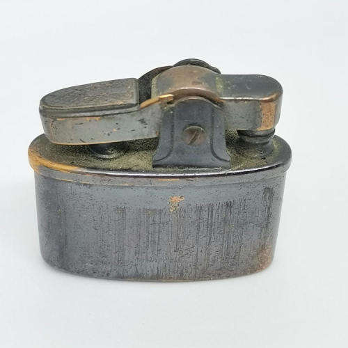 Small vintage pocket lighter - not working