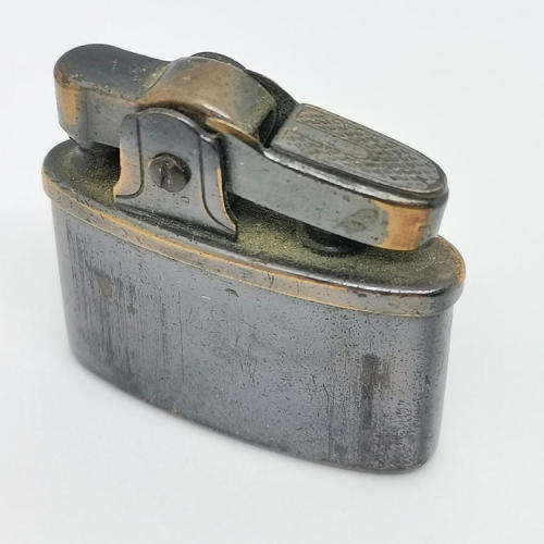 Small vintage pocket lighter - not working