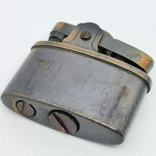 Small vintage pocket lighter - not working
