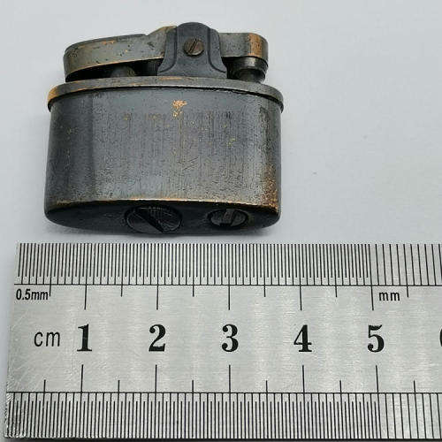 Small vintage pocket lighter - not working
