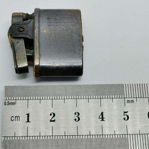 Small vintage pocket lighter - not working