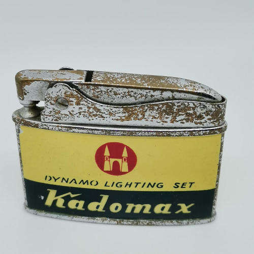 Vintage Penguin Kadomax Dynamo lighting set advertising lighter - not working
