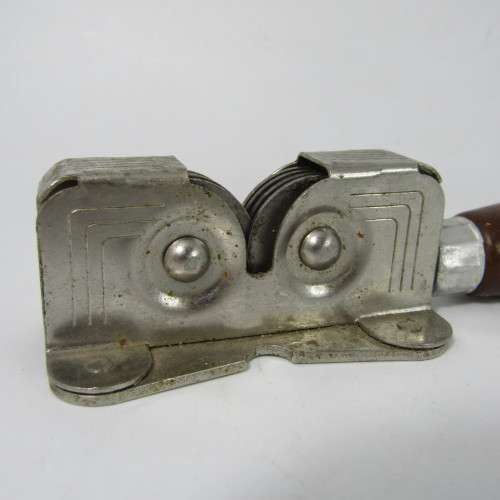 Vintage knife sharpener with wooden handle