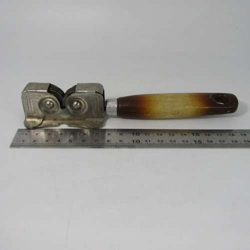 Vintage knife sharpener with wooden handle