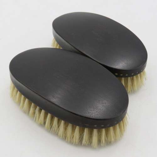 Pair of real ebony wood clothes brushes