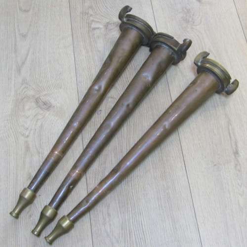 Set of 3 Antique brass fire hose nozzles on wooden display