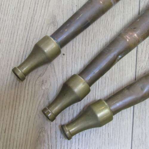 Set of 3 Antique brass fire hose nozzles on wooden display