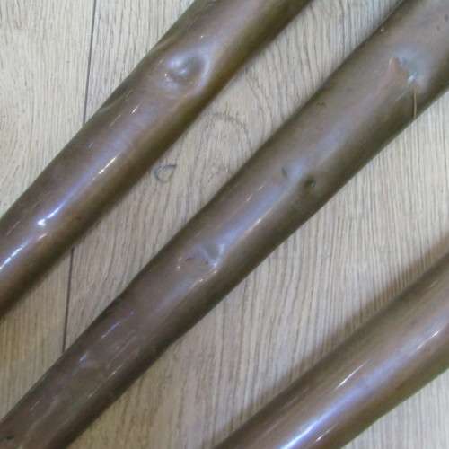 Set of 3 Antique brass fire hose nozzles on wooden display